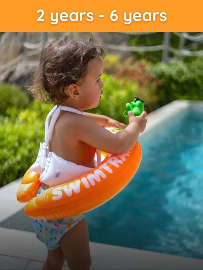 Child in the Orange SWIMTRAINER stage