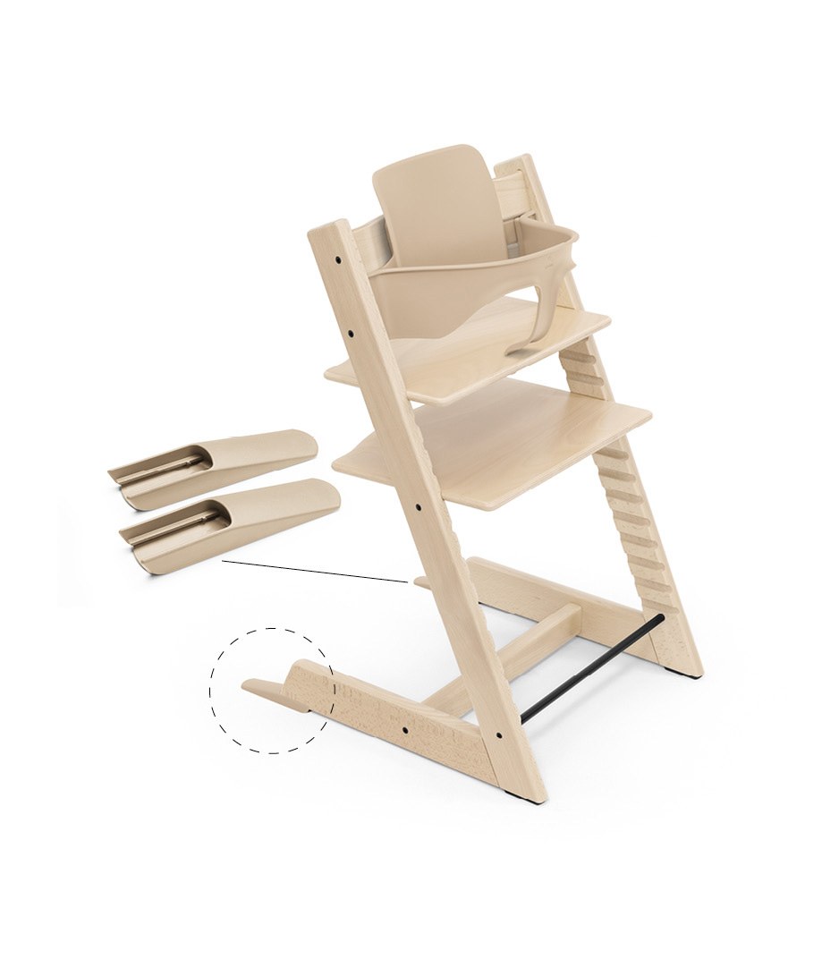 The two included Extended Gliders shown clipped to the rear legs of the Tripp Trapp Chair
